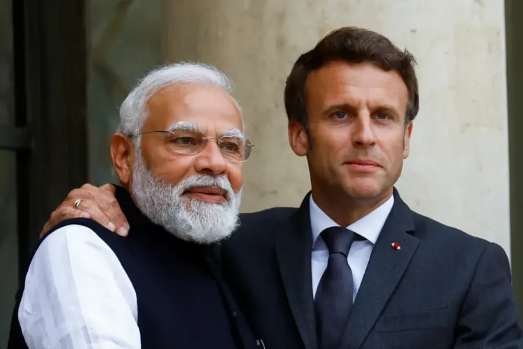 Left: PM Modi, Right: French President Emmanuel Macron