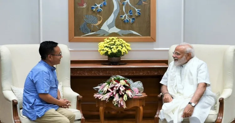 (Left) Sikkim Chief Minister Prem Singh Tamang (Right) PM Narendra Modi