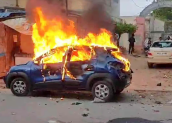 A car set ablaze during post-poll violence (File Image: Pic Credit: Indian Express)