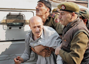 Jailed separatist Rashid being taken by the police in an old picture (Image Source: One India)