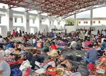 People evacuated from violence-affected areas take rest at a shelter (Source: ANI)