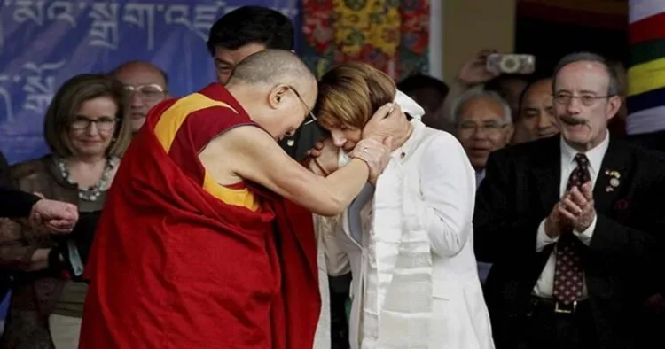 Dalai Lama giving a stole to Nancy Nancy Pelosi