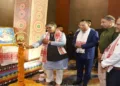 Assam Governor Gulab Chand Kataria lighting a lamp