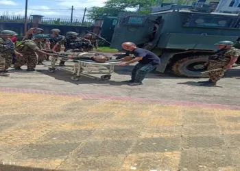 CRPF soldier being taken on a stretcher