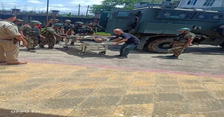 CRPF soldier being taken on a stretcher