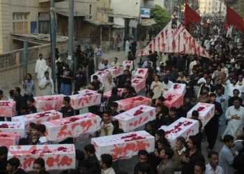 People carrying dead bodies of their kin following clashes (Image Source: X)