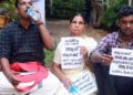 Pramod Kottooli, family and colleagues stage dharna