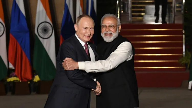 Left: Russian President Vladimir Putin, Right PM Modi