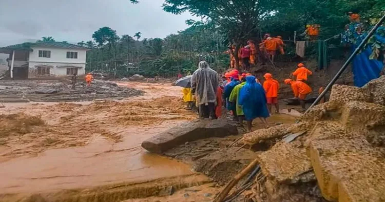 NDRF personnel conduct a rescue operation after huge landslides in the hilly areas near Meppadi, in Wayanad district