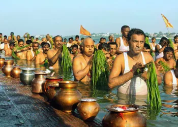 People take holy dip on Adi Amavasi (Image Source: Moneycontrol)