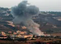 Smoke billows following an Israeli airstrike in the southern Lebanese border village of Chihine