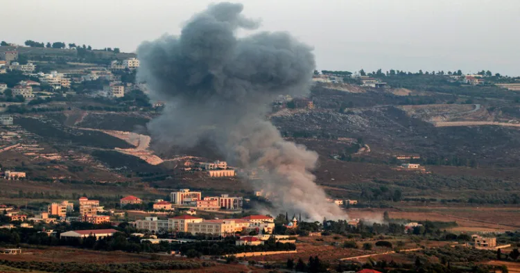 Smoke billows following an Israeli airstrike in the southern Lebanese border village of Chihine