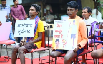 Victims of Maoist violence with placard during their visit to the national capital, New Delhi, Image Courtesy, The Narrative World