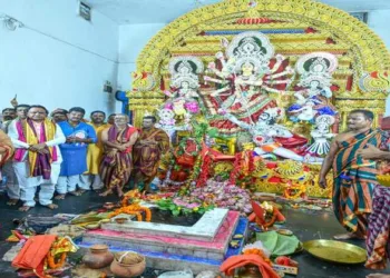 Chief Minister Mohan Charan Majhi along with the devotees at the Durga Puja Pandal