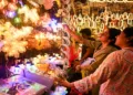 People shop fairy lights and decorative items at Crawford market ahead of the Diwali festival (ANI Photos)