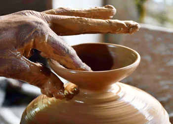 A potter makes earthen lamps (Diyas) for the upcoming Deepawali festival, (ANI Photos)