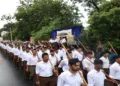 Swayamsevkas marching on the RSS Foundation Day