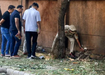 Officials of NIA and NSG outside the Delhi CRPF school where a blast occured on October 20