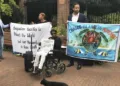 Protesters hold banners outside the World Court in The Hague, Netherlands, Monday, September 3, 2018, where judges listen to arguments in a case on whether Britain illegally maintains sovereignty over the Chagos Islands (Source: India Today)