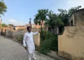 Jogendra from Mirchpur showing the house of a Dalit father and daughter duo who were burnt alive during caste violence back in 2011 (Photo: Sonam Singh, Organiser)