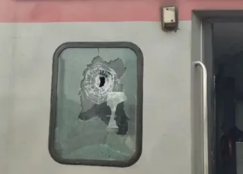 Shattered window pane of Nandan Kanan Express Train on which the bullet was fired