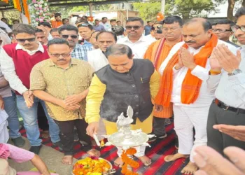 Food Supplies and Consumer Welfare Minister Krishna Chandra Patra lighting the lamp before the inauguration of  paddy procurement process