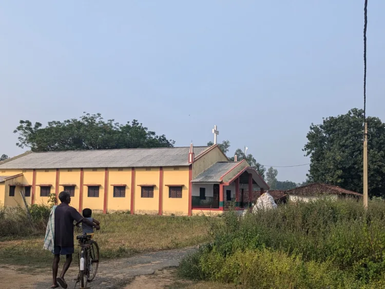 A tribal man walking towards Church, depicting how generations like him became "Adivasi Christians" (Photo: Sonam Singh, Organiser)