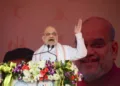 Home Minister Amit Shah addresses the gathering during the closing ceremony of ‘Bastar Olympics’ at Jagdalpur, in Bastar district (Photo: PTI)