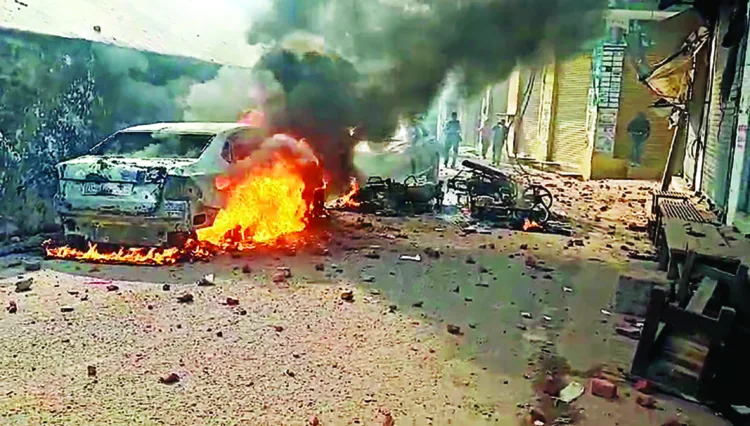 Sambhal, Nov 24 (ANI): A vehicle has been set on fire where an incident of stone pelting took place amid the survey of Shahi Jama Masjid by the survey team, in Sambhal on Sunday. (ANI Photo)