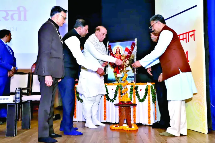 Rajnath Singh, Defence Minister, Alok Kumar, Sah SarKaryavah, RSS, Ramesh Aggarwal, President Delhi Sewa Bharti, Surendra Arya, Chairman Sewa Samman 2024 and Alok Garg, Chairman Swagat Samiti Sewa Samman 2024 lighting the lamp at inauguration ceremony