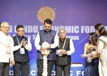 Maharashtra Chief Minister Devendra Fadnavis & others lighting the ceremonial lamp to inaugurate the World Hindu Economic Forum 2024, in Mumbai