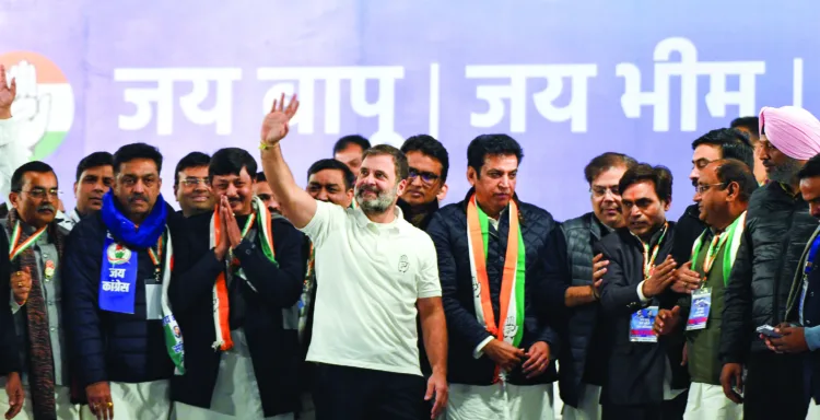 Congress MP & Lok Sabha LoP Rahul Gandhi waving to the gathering during a public rally ahead of the Delhi Assembly elections, at Seelampur in Delhi