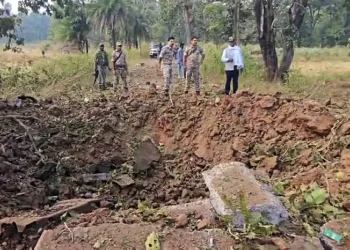 Security personnel at the site where an IED blast occurred on the security force's vehicle, in Bijapur on Monday. Reportedly, eight Dantewada DRG jawans and one driver lost their lives in the incident. (ANI Photo)