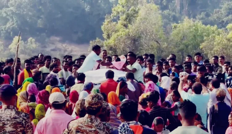 Last rites of martyred soldier Sudarshan Vetty being performed in Gumalnaar village with his 2-month-old son in centre, Image credit: X