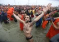 Image-8- A devotee at Mahakumbh.... The devotees is completely mesmerised after having taken the holy bath at Triveni Sangam (1)