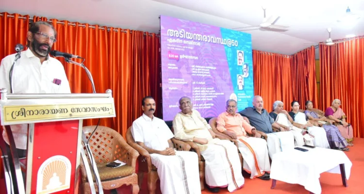 T. Satisan speaks. L/R:  Vijayakumar Master, Adv. Thampan Thomas, E.N. Nandakumar, Dr. Sebastian Paul, M.I. Mayadevi, Lalita Prakash, Latika Vijayan, Santa Nandakumar Pai.