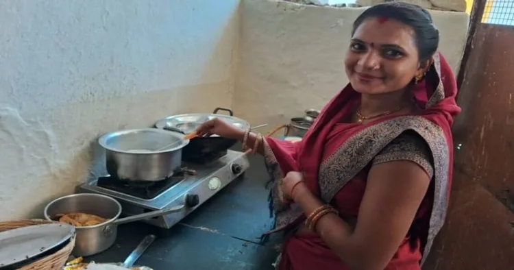 A tribal woman cooking food on gas stove in Madhya Pradesh's Shivpuri (Photo: Subhi Vishwakarma)