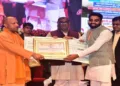 Uttar Pradesh CM Yogi Adityanath honours Sundaram Tiwari with Swami Vivekananda Yuva Rajya Puraskar