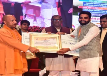 Uttar Pradesh CM Yogi Adityanath honours Sundaram Tiwari with Swami Vivekananda Yuva Rajya Puraskar