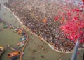 Flowers showered  from the helicopter on the devotees at Mahakumbh