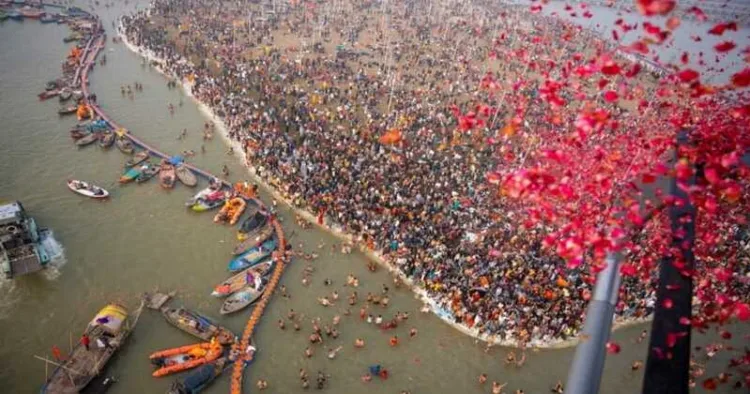 Flowers showered  from the helicopter on the devotees at Mahakumbh