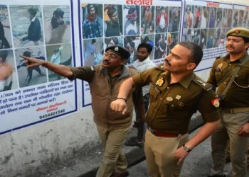 Police have displayed posters of 74 suspects involved in the November 24 violence