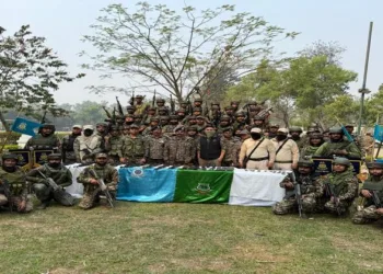 Security forces with seized arms