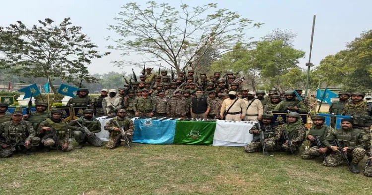 Security forces with seized arms