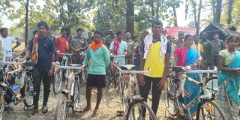 Villagers along with the officials during distribution of bicycles under the civic action program at Kondapalli, image source X @crpfindia