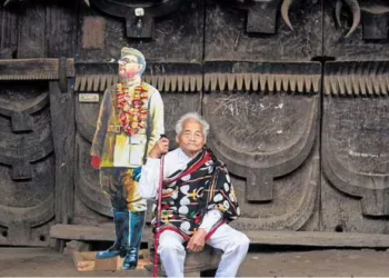 Poswuyi Swuro near a Netaji cutout in the house where the INA chief stayed for nine days,(Pic credit: Photographs by mongmei L Phom- File Image)