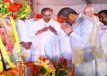 Union Education Minister Dharmendra Pradhan and others participating in the Vidya Bharati programme.