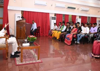 Governor of Odisha, Dr. Hari Babu Kambhampati, interacting with tribal students.