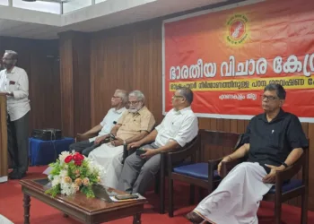 T. Satisan speaks. Also seen L/R: P.S. Aravindakshan Nair, Dr. C.M. Joy and M. Mohanan