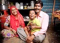 Cheerful Rajasthani Rural Indian Mother, Father, and Son (Image used for representative purpose)